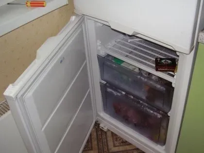 Навешивание дверей холодильника