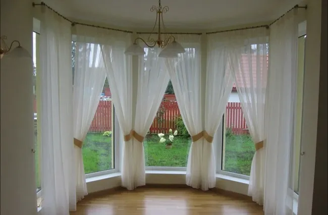 эркерные панорамные окна в частном доме