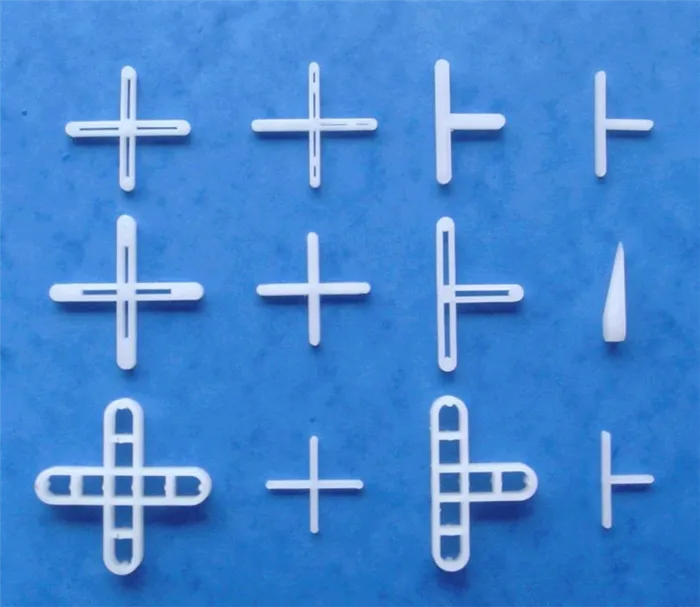 Различные формы пластмассовых крестиков для плитки