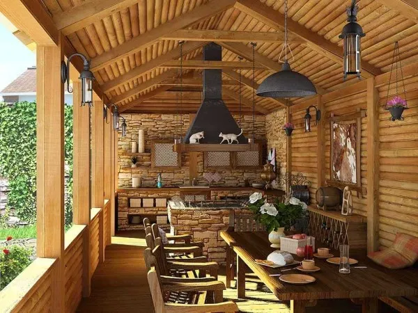 Открытая летняя кухня из бруса, пристроенная к дому