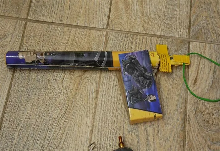 Как сделать пистолет из бумаги, который стреляет резинками и бумагой