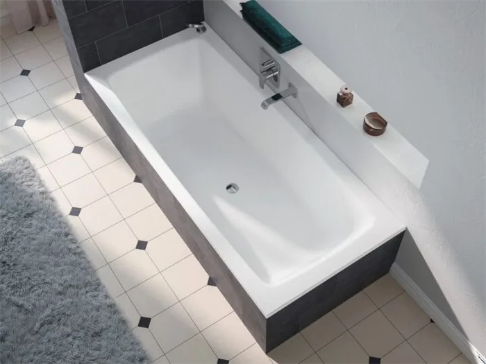 Стальная ванна с облицовкой плиткой